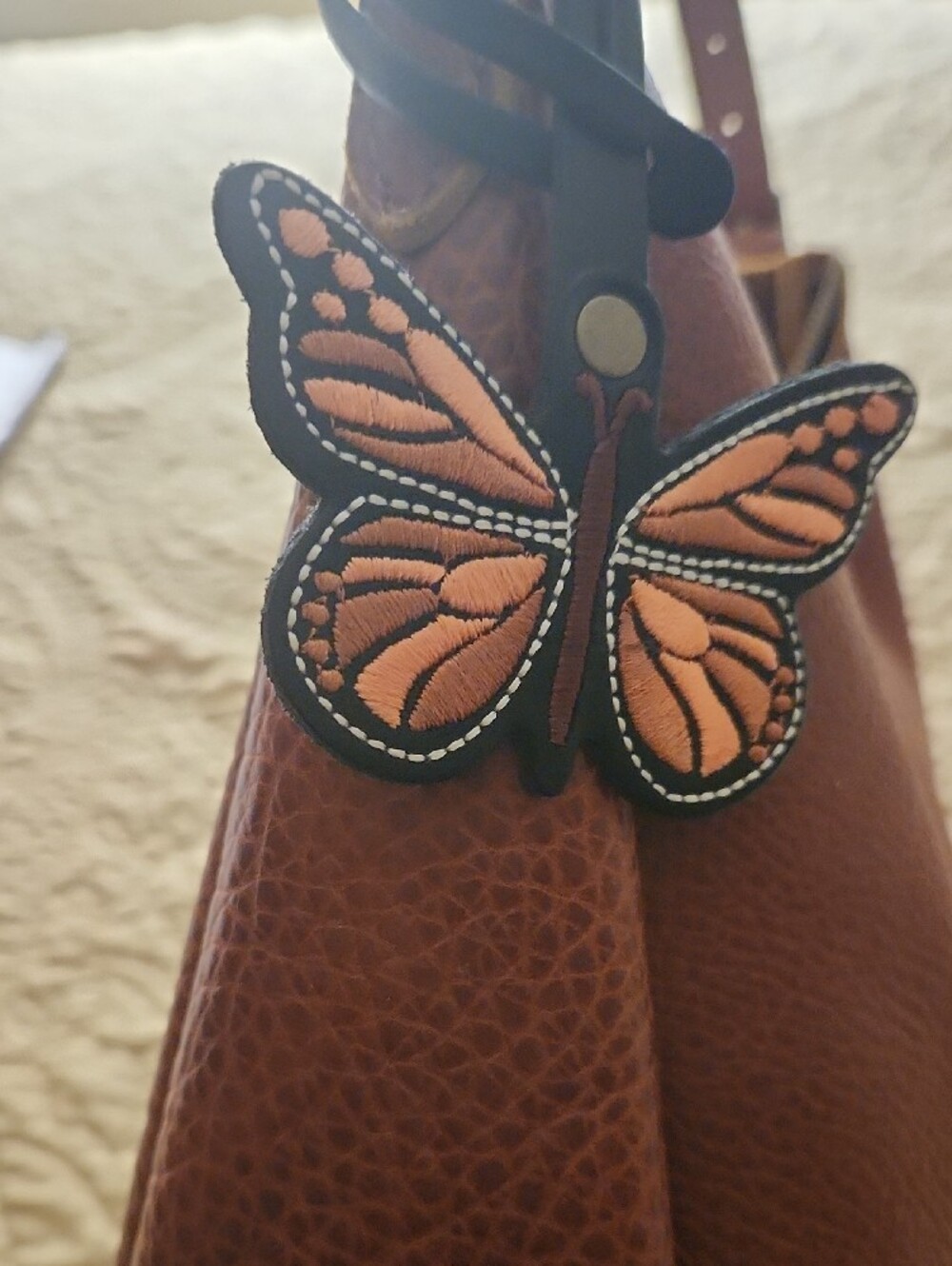 Butterfly Leather Strap Bag Charm in Black, Orange, Brown - Picture 4 of 5